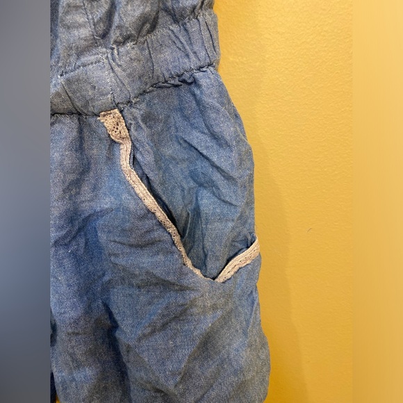 Medium denim romper with front buttons and pockets - Picture 4 of 5